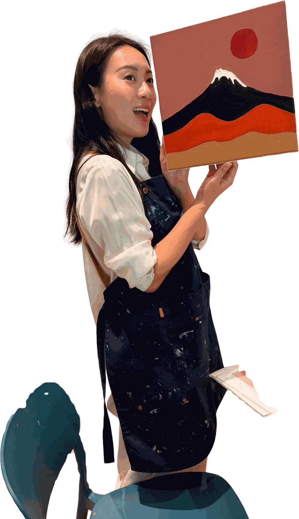 Tracy Lo holding one of her own paintings